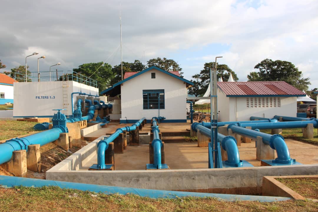 AquaFlow Uganda field engineers at a borehole site
